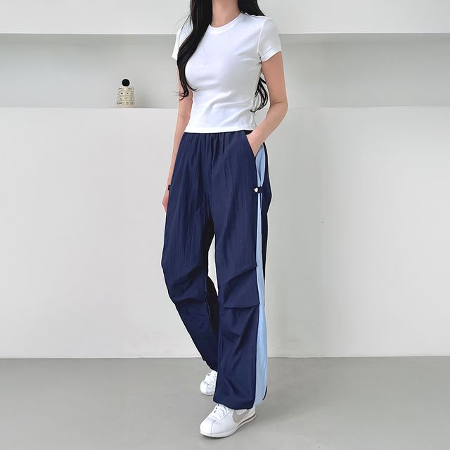 네미카 사이드 스냅 투톤 와이드 스트링팬츠 SD-250513