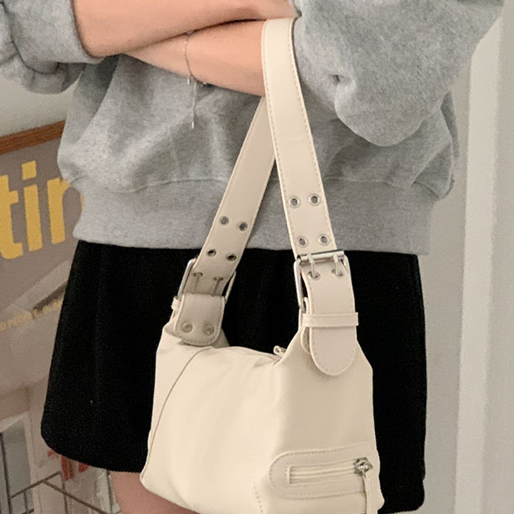 Twin hole shoulder bag